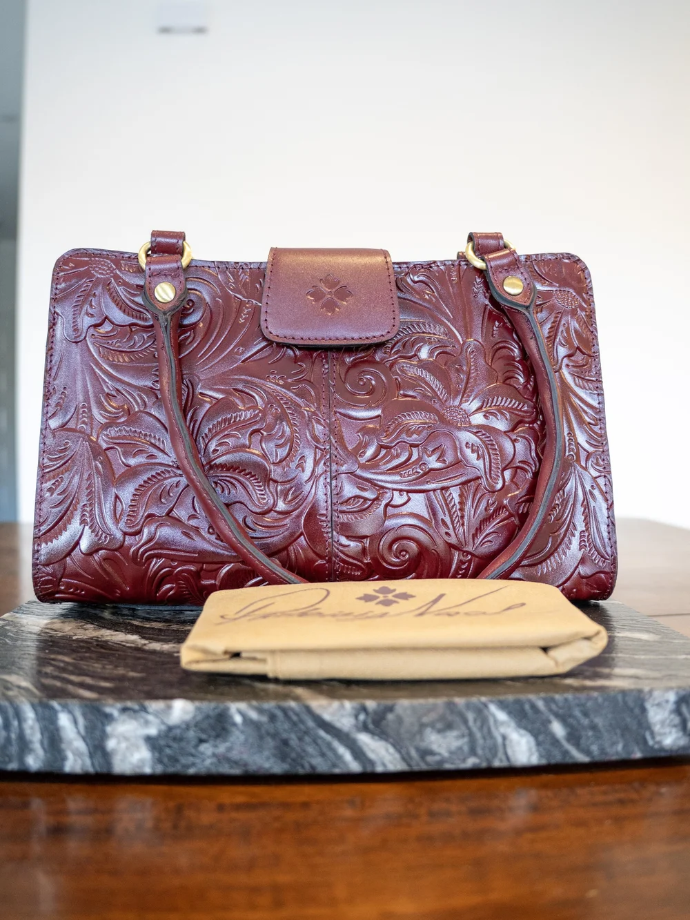 Embossed Floral Leather Satchel Bag
